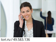pretty woman on the phone at home. Стоковое фото, агентство Ingram Publishing / Фотобанк Лори