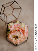 wedding rings with a wedding decoration. Стоковое фото, агентство Ingram Publishing / Фотобанк Лори