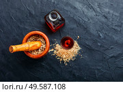 Dried eleutherococcus in herbal medicine.Preparation of medicines and tinctures from medicinal herbs.Copy space. Eleutherococcus in herbal medicine. Стоковое фото, агентство Ingram Publishing / Фотобанк Лори