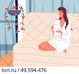 Happy smiling woman wearing bathrobe relaxing at sofa with a cup of drink at home. Cheerful brunette looking at curtains and hanging houseplant. Relaxation with tea or coffee after work at home. Happy smiling woman wearing bathrobe relaxing at sofa with a cup of drink at home, cheerful brunette. Стоковая иллюстрация, агентство Ingram Publishing / Фотобанк Лори
