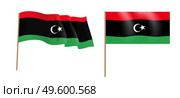 colorful naturalistic waving flag of the State of Libya. Vector Illustration. EPS10. colorful naturalistic waving flag of the State of Libya. Vector Illustration. Стоковая иллюстрация, агентство Ingram Publishing / Фотобанк Лори