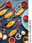 Lula kebab, minced meat skewered and grilled.Turkish food. lula kebab on a skewer. Стоковое фото, агентство Ingram Publishing / Фотобанк Лори