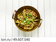 Kitchari,stewed rice with mash and spices fried in oil.Indian food. Kitchari, a spicy vegetarian dish. Стоковое фото, агентство Ingram Publishing / Фотобанк Лори