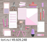 Office supply products realistic pink violet mockup items with scissors stapler notepads grey wood background vector illustration. Realistic Office Items. Стоковая иллюстрация, агентство Ingram Publishing / Фотобанк Лори