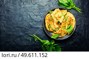 Azeyrbajan pie stuffed with fresh herbs. Qutabs or kutab. Copy space. Qutab with greens and cheese,space for text. Стоковое фото, агентство Ingram Publishing / Фотобанк Лори