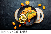 Delicious turkey breast roll stuffed herbs with citrus sauce. Turkey roll with kumquat and orange. Стоковое фото, агентство Ingram Publishing / Фотобанк Лори