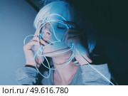 Weird dystopian theme portrait with blue neon lights. Стоковое фото, агентство Ingram Publishing / Фотобанк Лори