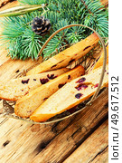 Biscotti popular italian dry biscuits. Cantuccini christmas food. Biscotti cantuccini cookies on a rustic background. Стоковое фото, агентство Ingram Publishing / Фотобанк Лори