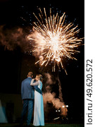 fiery pieces of a fire show against a dark sky and thunderstorms. Стоковое фото, агентство Ingram Publishing / Фотобанк Лори