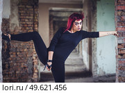 girl model in black with pink hair in an abandoned building. Стоковое фото, агентство Ingram Publishing / Фотобанк Лори