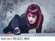girl model in black with pink hair in an abandoned building. Стоковое фото, агентство Ingram Publishing / Фотобанк Лори