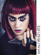 girl model in black with pink hair in an abandoned building. Стоковое фото, агентство Ingram Publishing / Фотобанк Лори