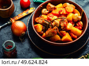 Meat ragout with mushrooms, zucchini, tomato and potatoes. Roast meat. Stew meat or ragout. Стоковое фото, агентство Ingram Publishing / Фотобанк Лори