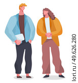 Cartoon colleagues standing. Red haired guy in blue jacket stands with tablet in hand, curly haired girl smiling to man, wears earrings, yellow jacket and brown lose pants. Conceptual office heroes. Cartoon office characters standing and talking. Red haired man and curly haired woman discussing. Стоковая иллюстрация, агентство Ingram Publishing / Фотобанк Лори