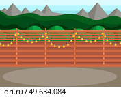 Sunny back yard with fence decorated with garland. Green spaces behind large wooden fence. Park, glade or backyard for hanging out and hosting events. Trees, and mountains as elements of landscape. Sunny back yard with fence decorated with garland. Place for hanging out and hosting events. Стоковая иллюстрация, агентство Ingram Publishing / Фотобанк Лори
