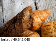fresh french bakery  around old style background . close up . flat lay. Стоковое фото, агентство Ingram Publishing / Фотобанк Лори