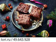 Panforte, delicious Christmas treat made from dried fruits and nuts. Panforte is an Christmas torte.. Panforte, Italian Christmas pastries. Стоковое фото, агентство Ingram Publishing / Фотобанк Лори