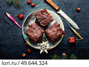 Panforte, delicious Christmas treat made from dried fruits and nuts. Panforte is an Christmas torte.. Panforte, Italian Christmas pastries. Стоковое фото, агентство Ingram Publishing / Фотобанк Лори