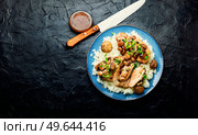 Baked chicken breast with marsala mushroom sauce and rice. Space for text. Chicken with mushroom sauce. Стоковое фото, агентство Ingram Publishing / Фотобанк Лори