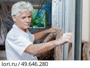 Insulating a new house. Стоковое фото, агентство Ingram Publishing / Фотобанк Лори