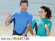 couple of bodyboard surfers ready to start. Стоковое фото, агентство Ingram Publishing / Фотобанк Лори