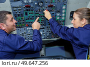 man and woman pilots training. Стоковое фото, агентство Ingram Publishing / Фотобанк Лори