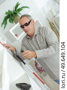 blind man with white stick at home. Стоковое фото, агентство Ingram Publishing / Фотобанк Лори