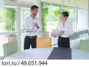 portrait of caterers preparing the venue. Стоковое фото, агентство Ingram Publishing / Фотобанк Лори