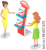 Woman distributes books product catalogs. Marketing, advertising campaign concept. Distributor advertises, promotes to customer. Female promoter telling about assortment of literature on stand. Woman distributes books, catalogs. Female promoter telling about assortment of literature on stand. Стоковая иллюстрация, агентство Ingram Publishing / Фотобанк Лори