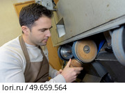 shoemaker repairs a shoe. Стоковое фото, агентство Ingram Publishing / Фотобанк Лори