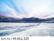 Landscape with the Solheimajokull glacier in Iceland in the sunset. Стоковое фото, агентство Ingram Publishing / Фотобанк Лори