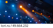rays of light illuminate the scene at the concert. Стоковое фото, агентство Ingram Publishing / Фотобанк Лори