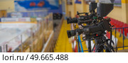 video cameras for live broadcast of sports competition in the ice arena. Стоковое фото, агентство Ingram Publishing / Фотобанк Лори
