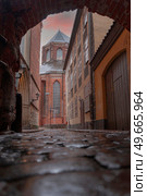 Riga Church of St. Peter and the streets of the ancient city. Стоковое фото, агентство Ingram Publishing / Фотобанк Лори