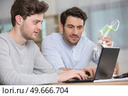 team of worker during drone training. Стоковое фото, агентство Ingram Publishing / Фотобанк Лори