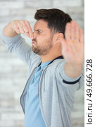 someone farted and it smells very bad. Стоковое фото, агентство Ingram Publishing / Фотобанк Лори