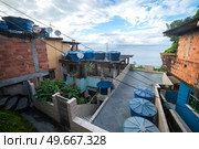 Favelas in the city of Rio de Janeiro. A place where poor people live. Brazil. Стоковое фото, агентство Ingram Publishing / Фотобанк Лори