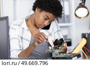 woman working in non-traditional jobs. Стоковое фото, агентство Ingram Publishing / Фотобанк Лори