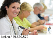 portrait of happy worker making a dental prothesis. Стоковое фото, агентство Ingram Publishing / Фотобанк Лори