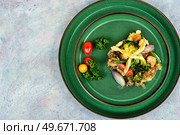 Homemade meat pie, quiche with Brussels sprouts, pumpkin and broccoli. Copy space, flat lay. Slice of freshly baked meat pie. Стоковое фото, агентство Ingram Publishing / Фотобанк Лори