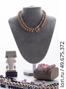 author jewelry demonstrated  against  white background. fashion and jewelry concept. Стоковое фото, агентство Ingram Publishing / Фотобанк Лори
