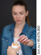 female taking a cigarette. Стоковое фото, агентство Ingram Publishing / Фотобанк Лори