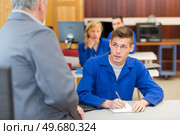 group of vocational trainee during lesson. Стоковое фото, агентство Ingram Publishing / Фотобанк Лори