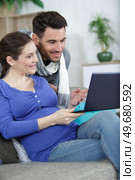 couple of young man and woman online. Стоковое фото, агентство Ingram Publishing / Фотобанк Лори