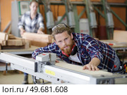 man works in the carpentry workshop. Стоковое фото, агентство Ingram Publishing / Фотобанк Лори