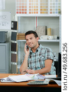male office worker expanding the business. Стоковое фото, агентство Ingram Publishing / Фотобанк Лори