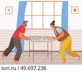 People having fun at home or at work. Friends playing table football match. Couple man and woman relaxing at office enjoying fun time with table game. Personages entertaining in free time, soccer game. Man and woman having fun at home or at work. Friends playing table football match, soccer game. Стоковая иллюстрация, агентство Ingram Publishing / Фотобанк Лори