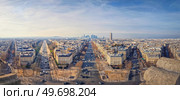 Wide angle Paris cityscape with view to La Defense metropolitan district, France. Beautiful parisian architecture with historic buildings, landmarks and busy city streets with car traffic. Стоковое фото, агентство Ingram Publishing / Фотобанк Лори