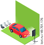 Red car on green screen backdrop in photo or film studio. Green background and lighting for movie filming. Chromakey with spotlights and automobile on set. Making film with vehicle, transport. Red car on green screen backdrop in photo or film studio. Chromakey with spotlights and automobile. Стоковая иллюстрация, агентство Ingram Publishing / Фотобанк Лори