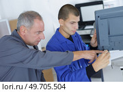 lecture for the apprentice. Стоковое фото, агентство Ingram Publishing / Фотобанк Лори